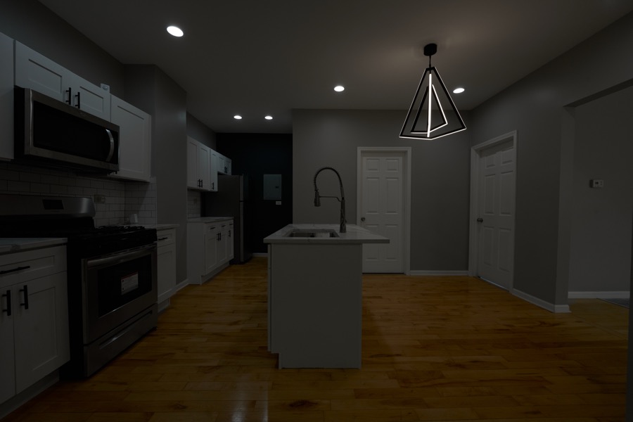 The same kitchen exposed two stops down, keeping detail in the brightest areas