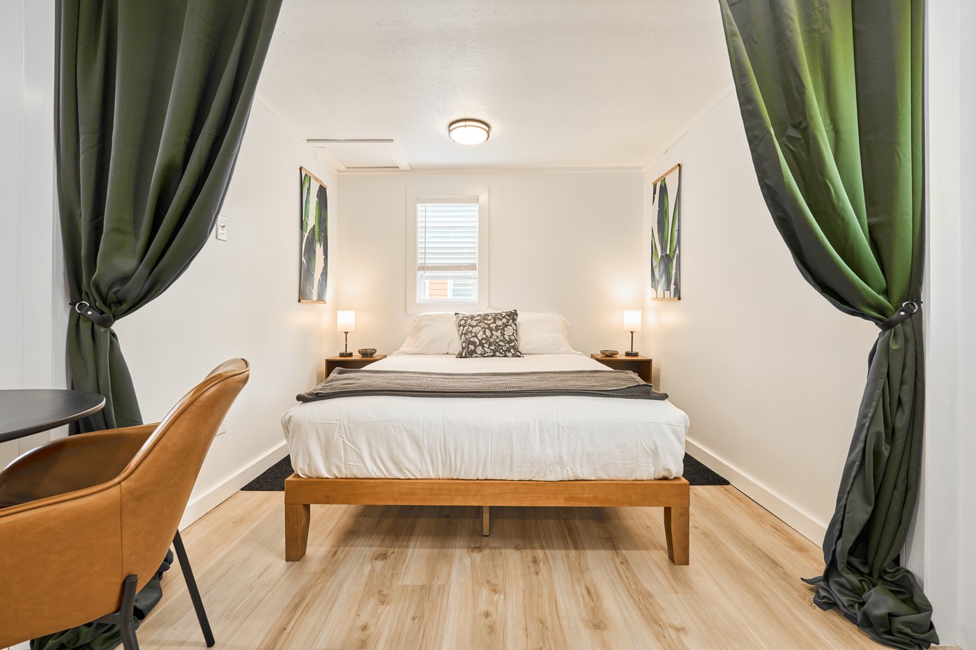 Bedroom with green curtains