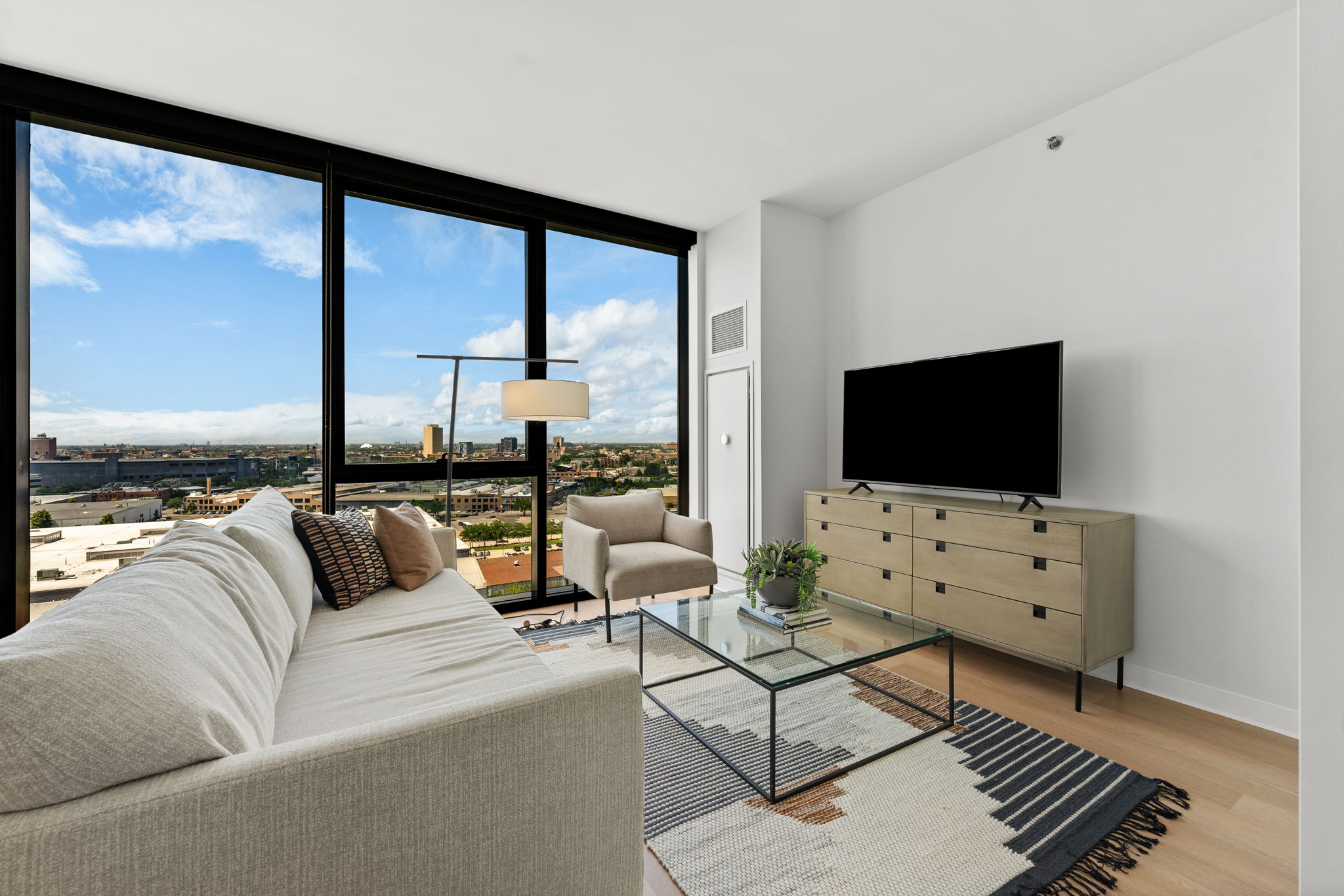 A city living room with corner windows